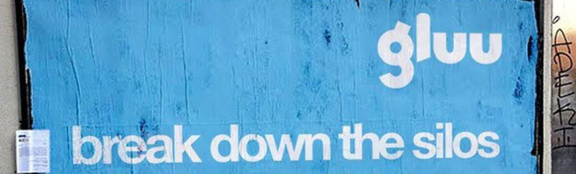 billboard for Gluu it reads "break down the silos".